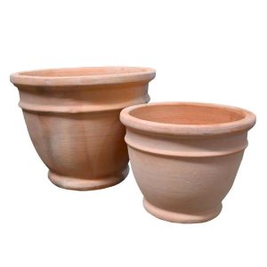 Two terracotta pots on a white background. feature pots for decorative plants orange terracotta planter pots