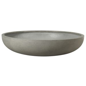 The Urban Low Bowl Black L 110x27cm (Copy) is a shallow, round concrete bowl with a smooth exterior and slightly textured interior, featuring a sleek black finish.