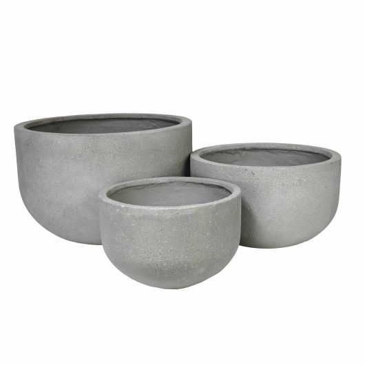 A collection of UrbanCrete Deep Bowl Cement S 70x61cm planters.