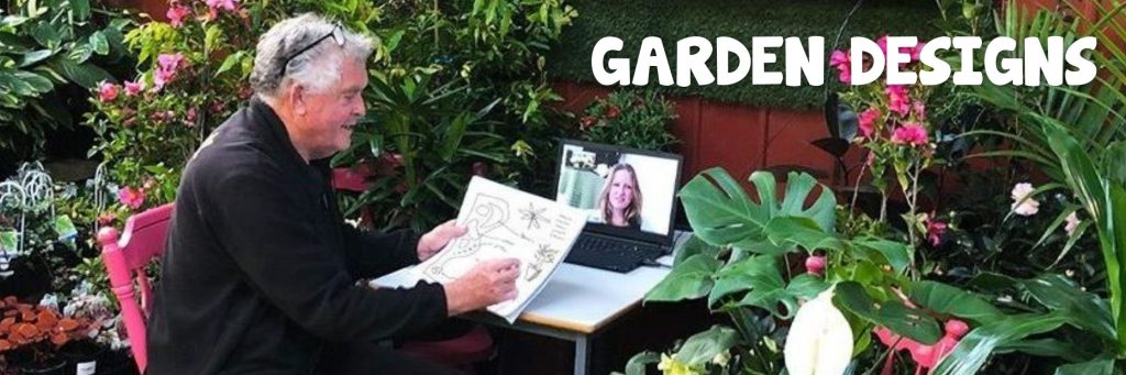 In a lush garden setting, a man presents his sketches to someone on a laptop screen. The "GARDEN DESIGNS" text subtly highlights the scene, hinting at an exclusive Boxing Day Sale that could transform your outdoor space into a masterpiece.