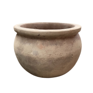 A round, smooth basalt pot with a wide opening, designed as an Antique Terracotta WaveRim Egg Basalt S 35x30cm.