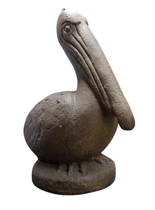 The Iridami Small Pelican Rustiq sculpture (30x64x54cm) in white stone exudes tranquility with its large beak and round body, echoing the elegance of Iridami reliefs and capturing Dewi Sri's serene essence.