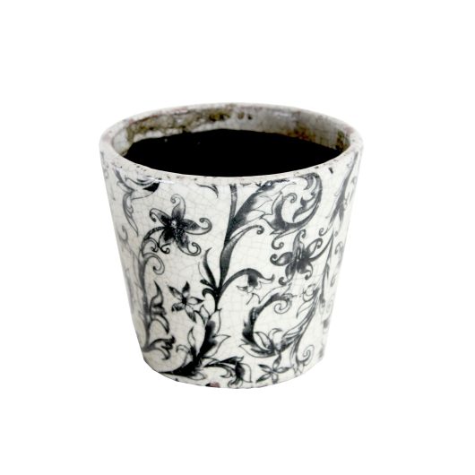 A Tang Antique Cover Pot in Rustic Blue (12x10cm) with a black floral pattern, containing dark soil.