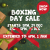 Gift boxes with green ribbons and Christmas ornaments on a lush green background. Text: "Boxing Day Sale" with dates, and "Extended to: 6pm, 1 Jan" in bold. "Shop Now" in a red speech bubble, perfect for sprucing up your plant nursery this holiday season.